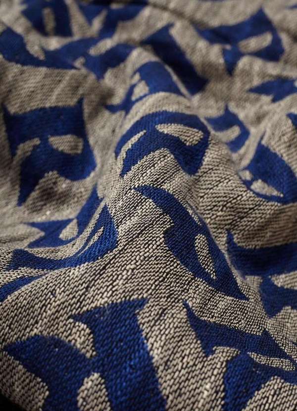

Manta Jacquard Logo R Cinza